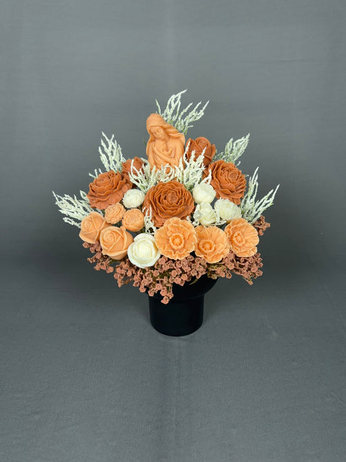 Mother Love candle bouquet with mother and baby centerpiece, peach and mocha roses, ivory blooms and silver fillers in a black ceramic pot