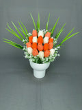 Tulip Garden Peach tulip candle bouquet with peach orange and white tulips, green leaves and white fillers in a white ribbed ceramic pot